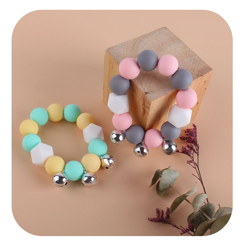 Bebé creativo sonando juguete mordedor Nueva campana de silicona teether pulsera dientes infantiles molienda palo