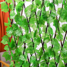 廠家葡萄葉假花藤條假樹葉裝飾花藤綠葉塑料花纏繞吊頂花綠植藤蔓