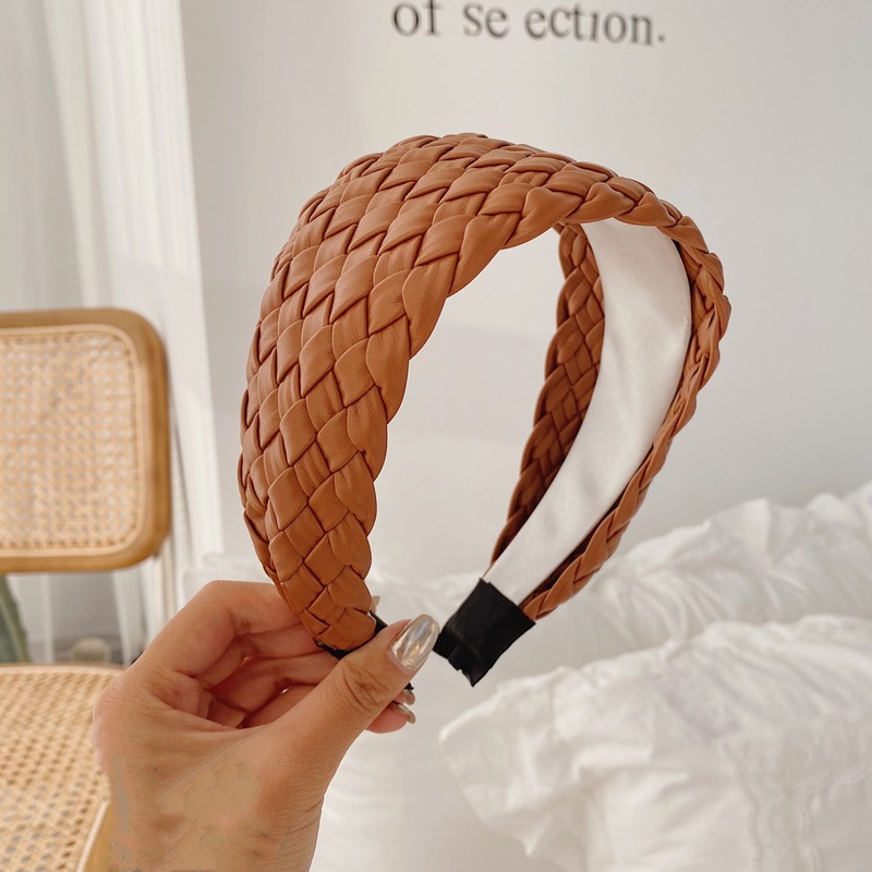 Estilo coreano tejido de ala ancha diadema de moda nuevo elegante imitación de cuero PU diadema Internet celebridad cara lavado cabello paquete malla pelo grutas para las mujeres
