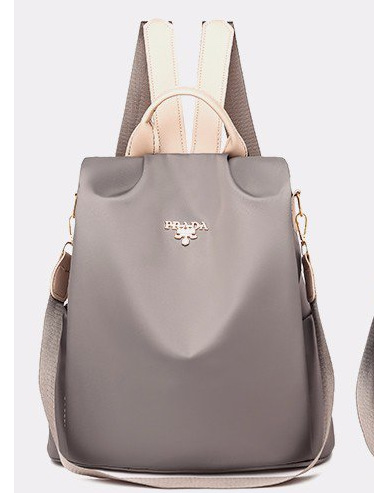 Nuevo estilo de campus de gran capacidad de nylon impermeable antirrobo viaje multifuncional estilo coreano mochila mujer color sólido todo a juego