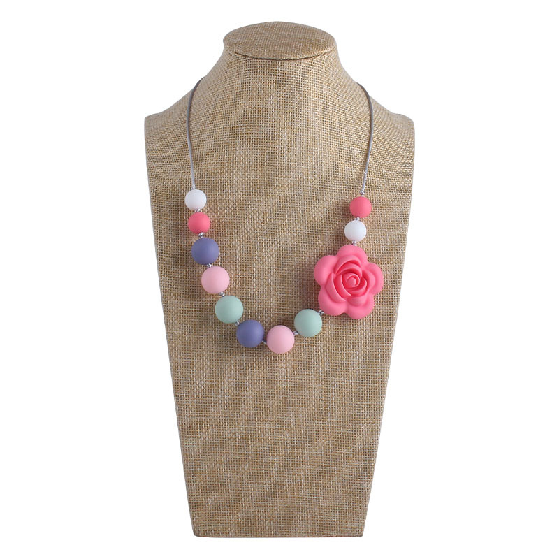 Venta caliente forma de Rosa collar de silicona mordedor masticable colgante infantil molar mordedor de silicona pulsera de cuentas