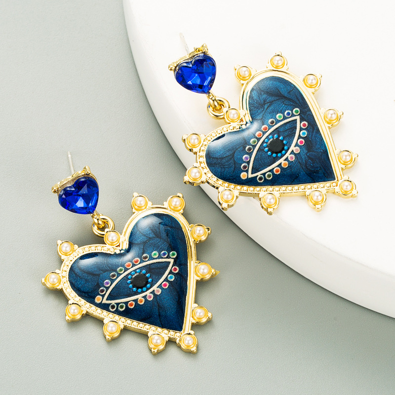 Heart-shaped Devil's Eyes Pearl Alloy Earrings display picture 5