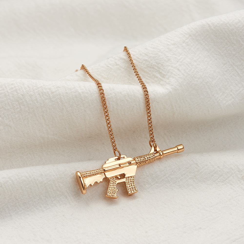 copper pendant machine gun necklace