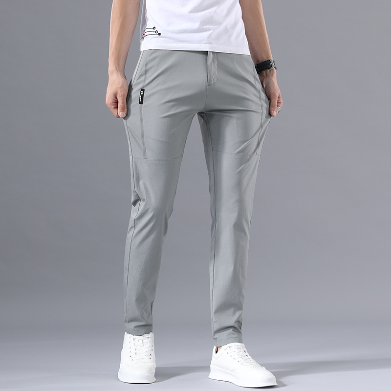 Pantalones casuales de hombre populares de calidad 2021 estilo coreano de moda slim fit pequeño algodón recto elástico pantalones transpirables para hombres