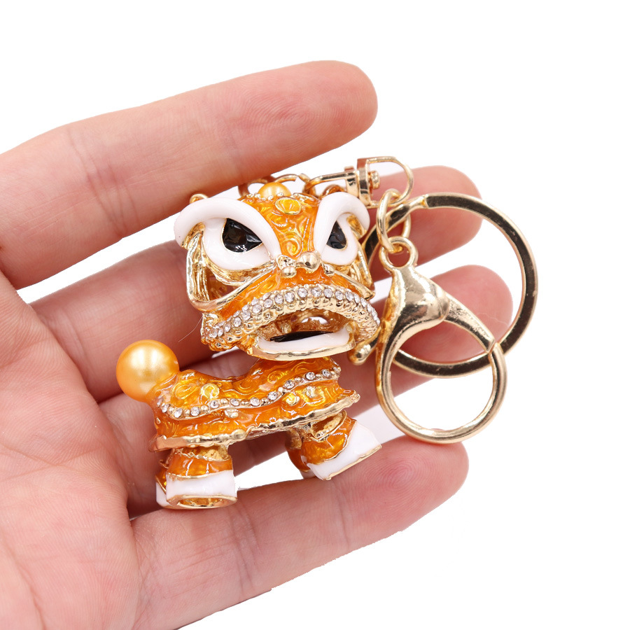 Estilo chino regalo creativo grande Kirin colgante 5*4,5 cm aleación danza León llavero adornos al por mayor