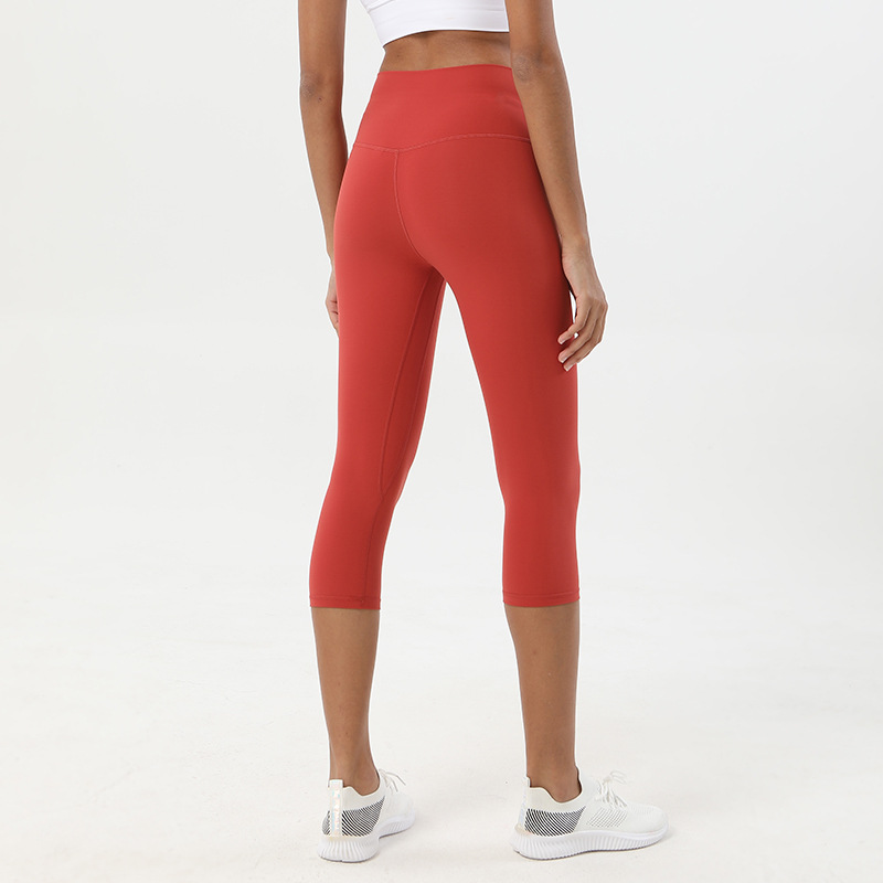 Pantalones cortos desnudos cepillados de doble cara pantalones de yoga pantalones de cintura alta de Europa y América de las mujeres de elevación de la cadera melocotón Pantalones deportivos de fitness