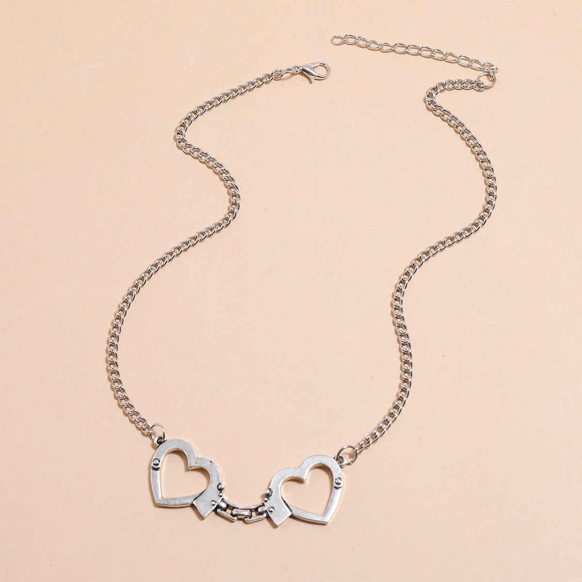 Simple Fashion  Hollow Double-heart Clavicle Chain Heart-shaped Handcuff Couple Necklace display picture 5