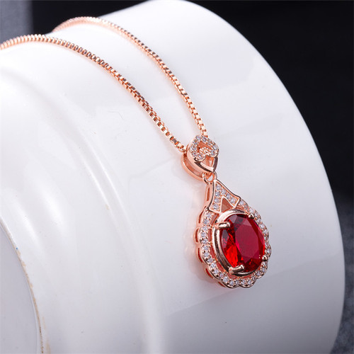 Korean style light luxury necklace for women, flower-shaped ruby ​​pendant, micro-set pendant, niche design clavicle chain necklace