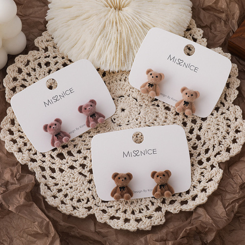 Cute flocked bow bear earrings Japanese and Korean cartoon girl earrings autumn and winter versatile Internet celebrity plush ear jewelry