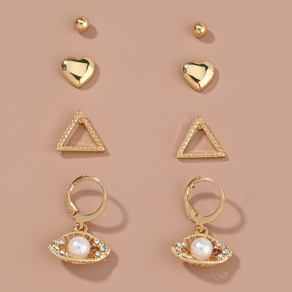 Simple Metal Retro Geometric Inlaid Pearl Earrings Set Wholesale display picture 1