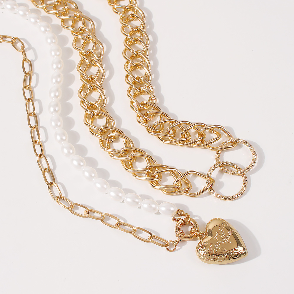 Fashion Punk Style Alloy Pearl Fashion Heart-shaped Pendant Texture Multilayer Chain Women's Necklace display picture 9