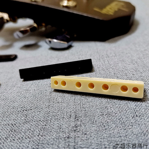 Cow bone saddle, folk guitar saddle, upper saddle, saddle bridge, white and black guitar saddle