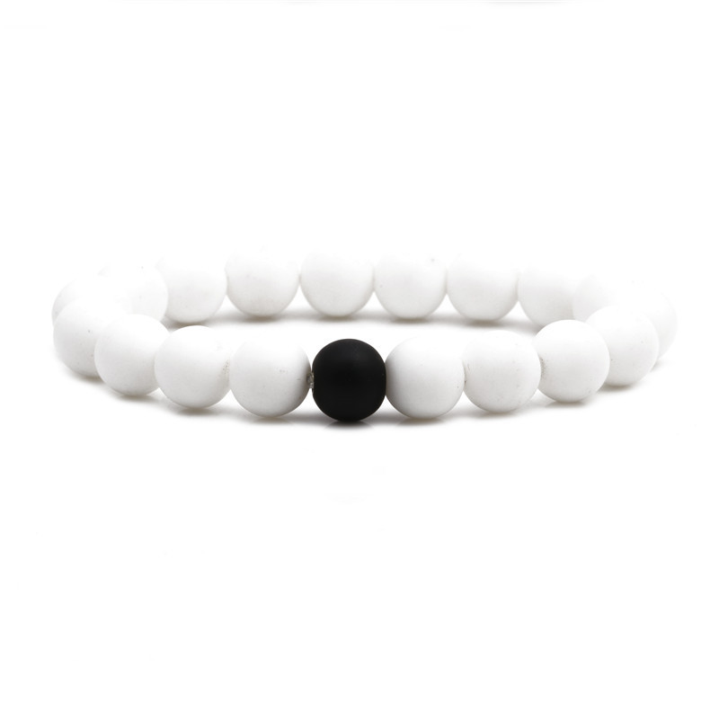 Fashion 10mm Black Frosted Porcelain White Stone Beaded Bracelet Elastic String Beaded Bracelet display picture 2