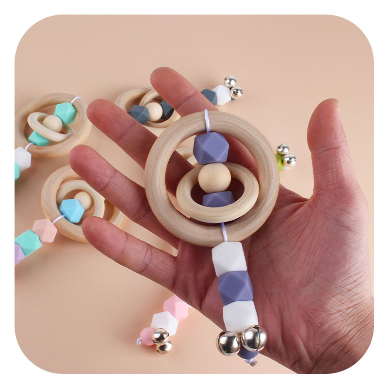 Nueva DIY dibujos animados Hemu anillo de madera mano palo sonajero juguete mordedor bebé silicona teether palo