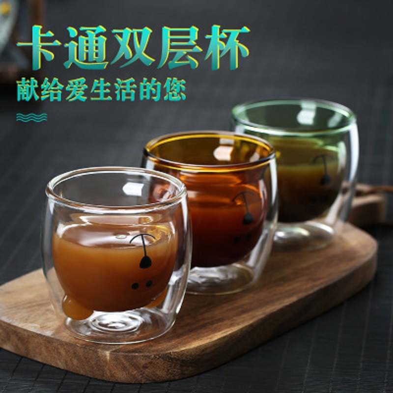 Fábrica al por mayor de vidrio transparente fondo grueso oso simple oficina de vidrio hogar multi-estilo de doble capa taza de agua