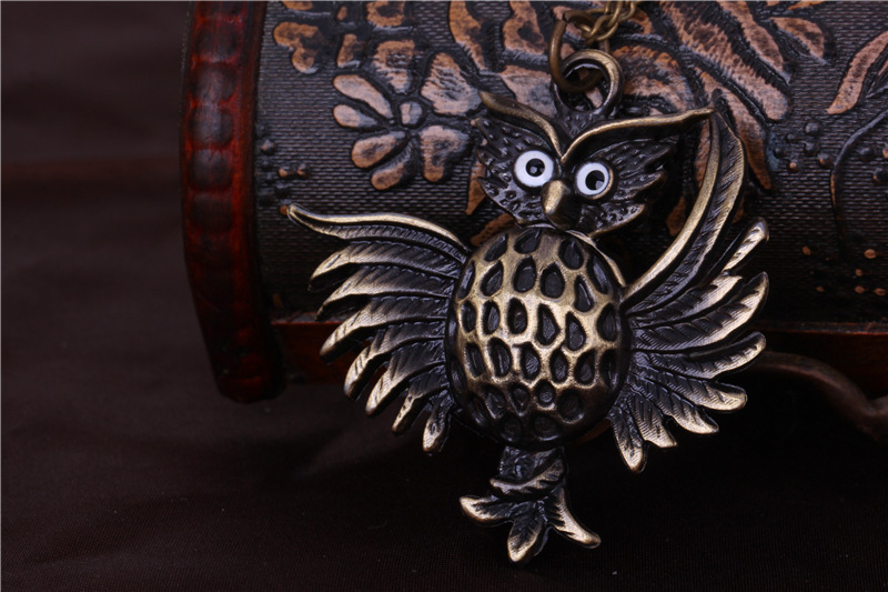 Retro wings big eyes owl pocket watch necklace watch Korean women's sweater chain watch manufacturers wholesale 6051