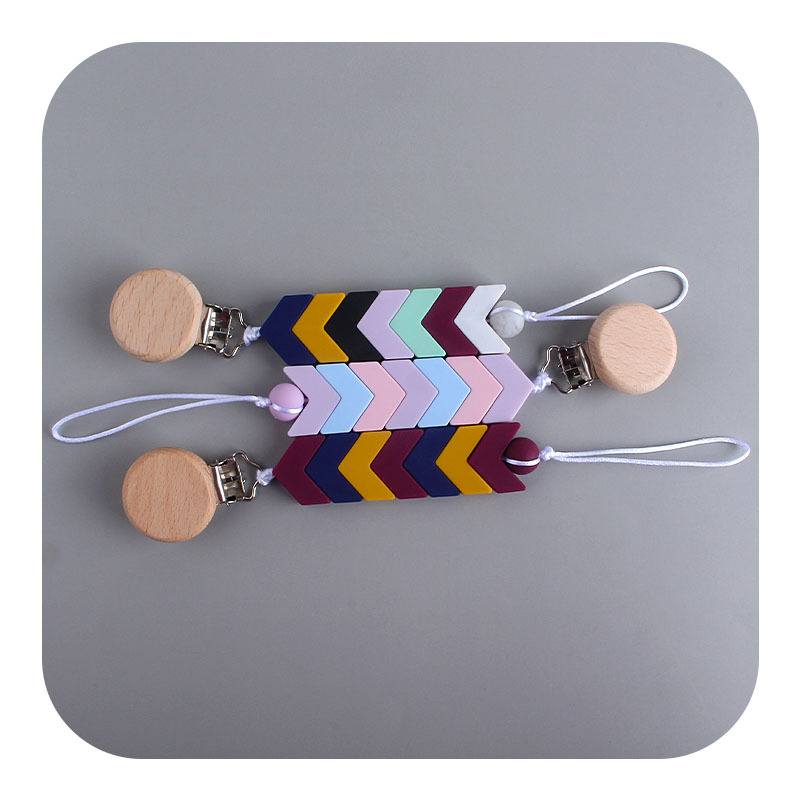 Nuevo bebé haya chupete clip bebé creativo calmante silicona flecha marca mordedor chupete cadena anti-gota cadena