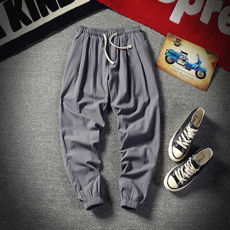 Pantalones cortos de los hombres recortados versátiles estilo coreano Pantalones deportivos de moda Pantalones de verano sueltos de los hombres pantalones atados al tobillo pantalones casuales pantalones de los hombres flacos