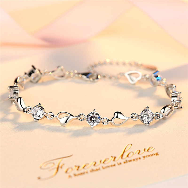 Copper bracelet heart shaped with zircon