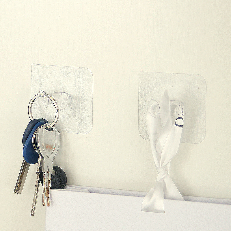 A092 gancho de enchufe de alambre transparente de la pared del hogar adhesivo de plástico gancho libre gancho de cocina gancho pegajoso