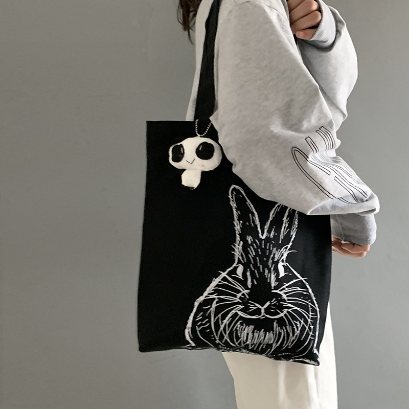 Bolsa de lona femenina estudiante de un solo hombro japonés ins bolsa de tela impresa de dibujos animados lindo de gran capacidad