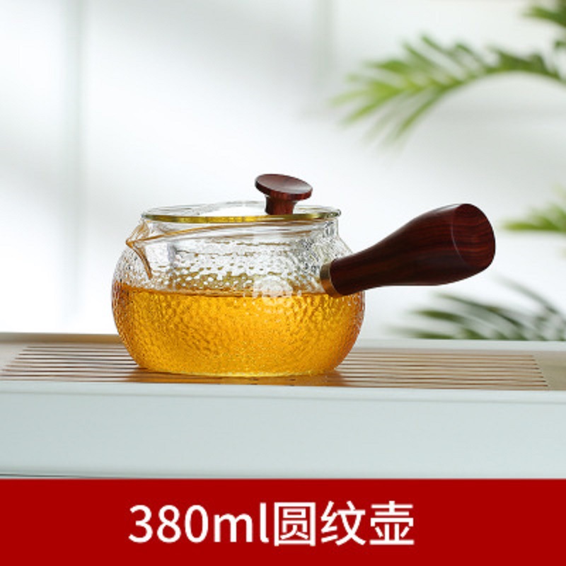 Fábrica al por mayor patrón de martillo mango lateral olla de vidrio resistente al calor tetera de La Flor eléctrica estufa de cerámica calefacción Kung Fu juego de té tetera