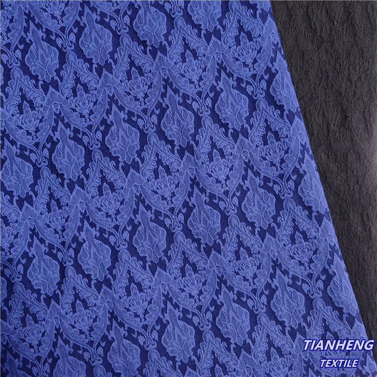 现货涤棉鸟头罗缎提花时尚男女装裤装西装外套连衣裙箱包面料批发