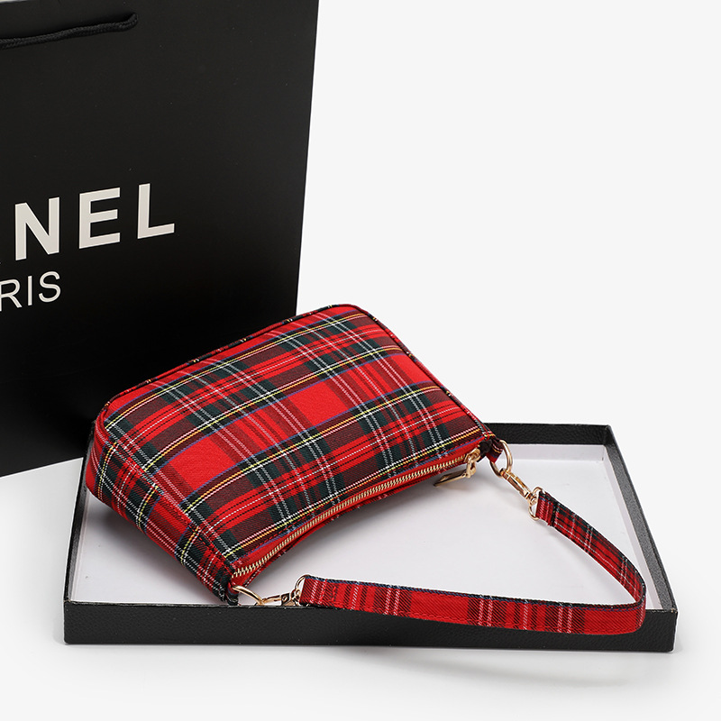 Damestassen 2023 Koreaanse versie van de nieuwe internetberoemdheid geruite baguette okseltas canvas tas literaire retro cross-body schoudertas_voghion.com