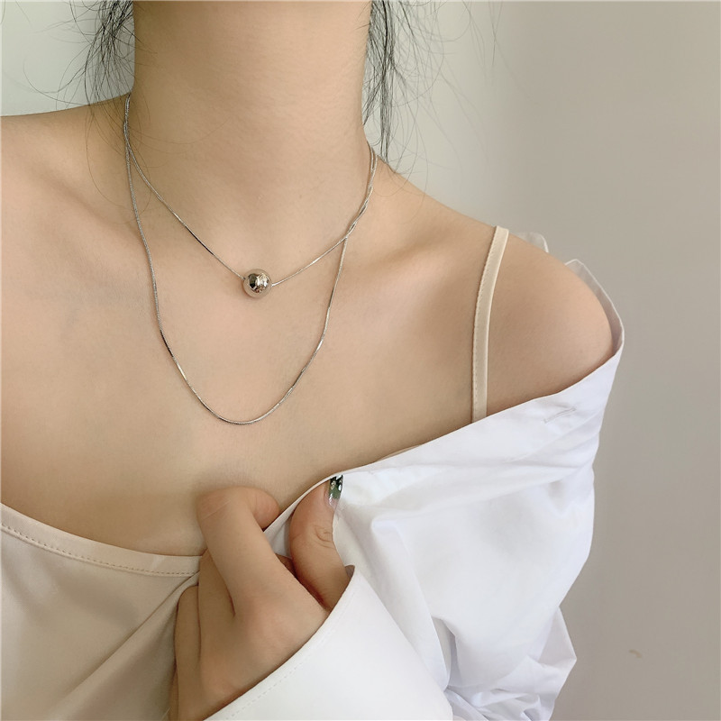 Einfache Japanische Und Koreanische Doppels Chicht Halskette Kurze Runde Perlen Halskette Netto-promi-temperament Kalt Wind Schlüsselbein Kette Halskette Choker display picture 12