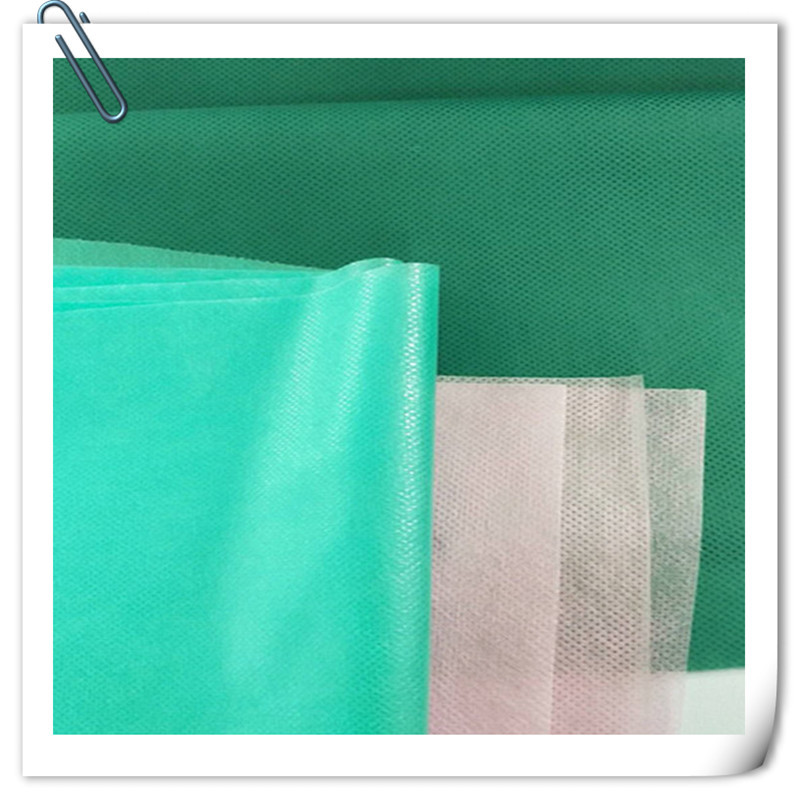 淋膜无纺布pe+pp复合隔离衣原材料  用于包布 床单床罩等