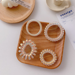 Human Fish Princess transparent phone wire shared in circles, female headband, thick braided ponytail, influencer hair tie, minimalist cold wind hair tie