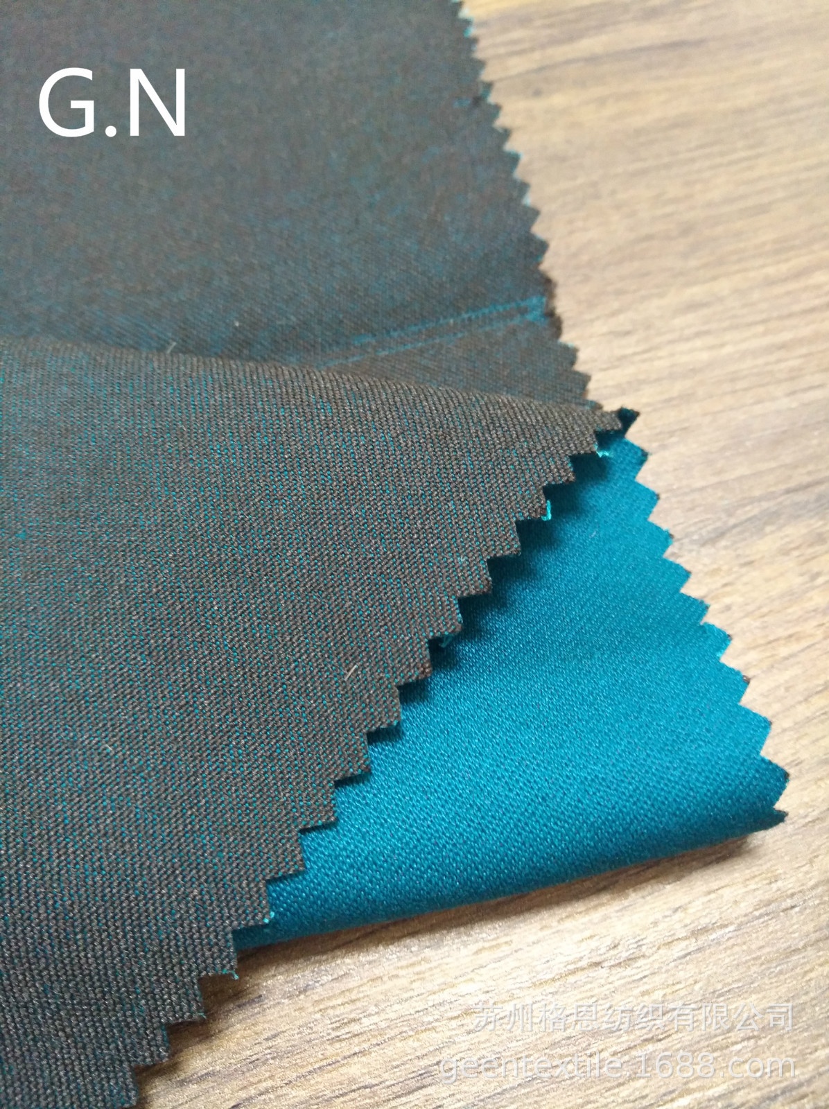 黑丝棉涤弹力贡缎  32S/2*200D+40D  260G/M2  活性环保染色