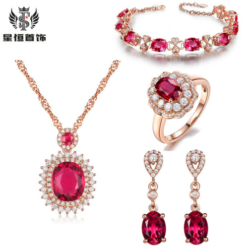 Hollow four-leaf clover bracelet, flower full diamond live ring, rose crystal earrings, simulated ruby ​​tourmaline clavicle chain