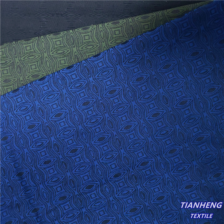 现货涤棉罗缎几何提花  时尚男女装裤装西装外套帽子箱包面料批发