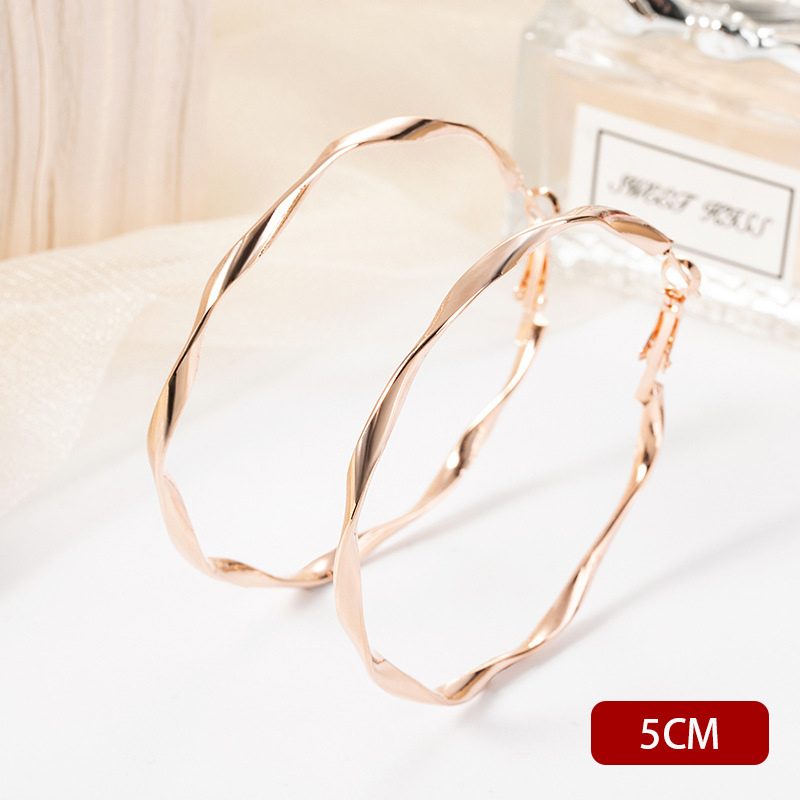 H1032 twisting circle gold 5cm
