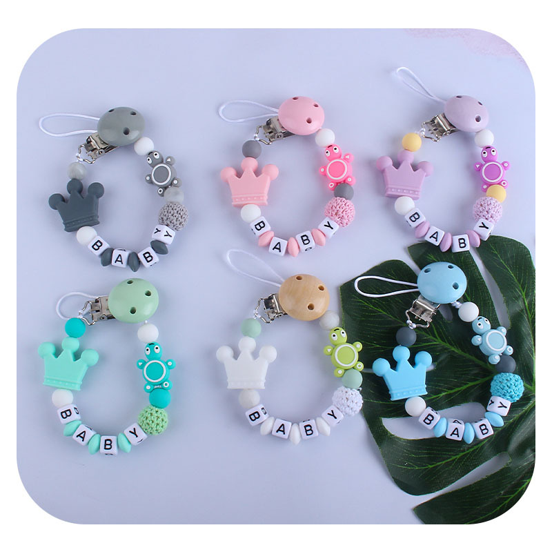 Bebé de plástico carta chupete clip bebé calmante corona de silicona tortuga mordedor chupete cadena anti-gota cadena