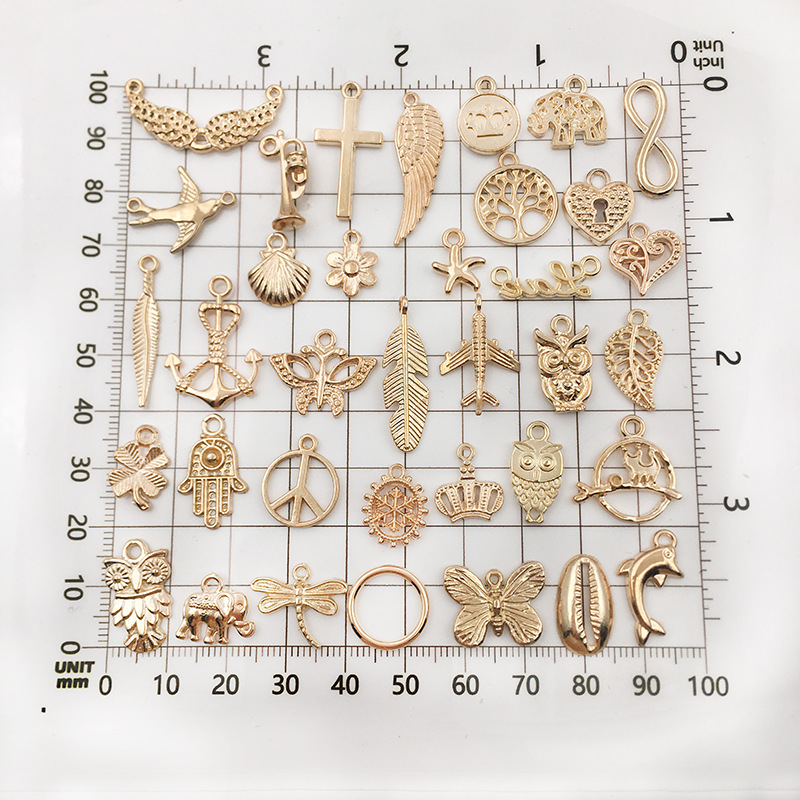 Aliexpress alloy kc gold diy jewelry accessories, earrings, bracelets, necklaces, pendants and pendants are mixed in 110 pieces per package pic 5