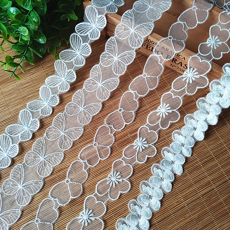 人造丝精美蝴蝶网纱花边服饰厂家批发婚纱童装各种款式