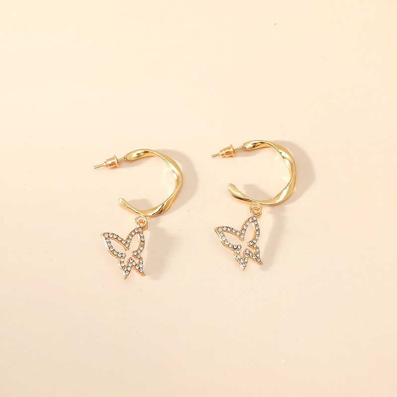 Korea Fashion Sweet Lady Hollow Butterfly Simple Age-reducing Geometric Twist C-shaped Alloy Earrings display picture 1