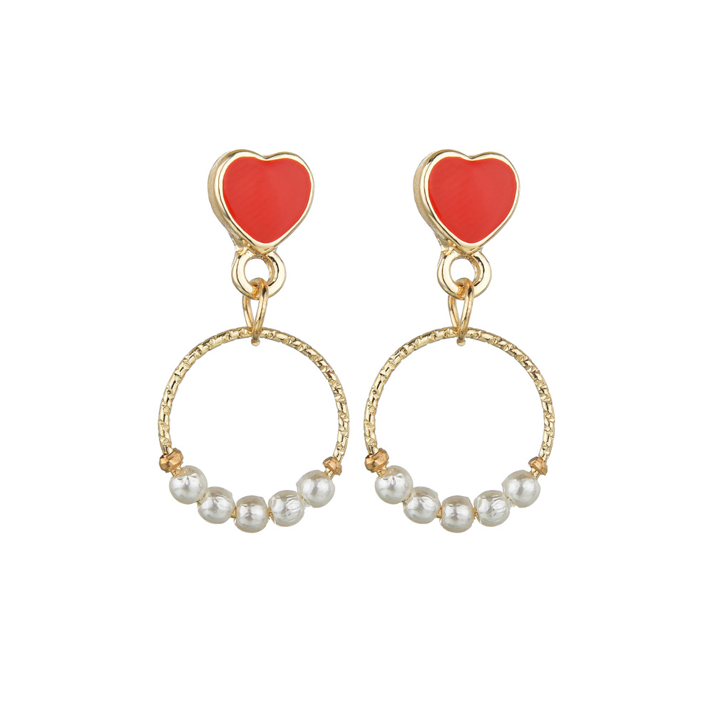 Korean Sweet Pink Love Heart-shaped Earrings Simple Pattern Circle Elegant Pearl Earrings Wholesale Nihaojewelry display picture 1