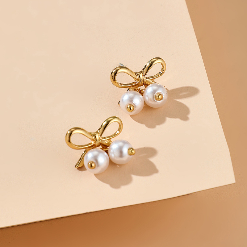 Korean Style Asymmetry Stars Elk Bow Pearl Earrings Simple Spread Wholesale Nihaojewelry display picture 15