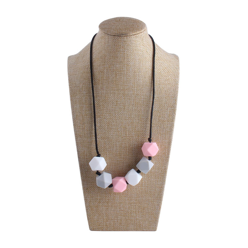 Comercio exterior Amazon collar nuevo bebé molar silicona octogonal mordedor collar masticable colgante mordedor palo