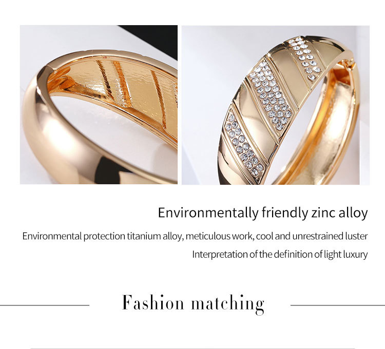 curved smooth diamond gold-plated spring bracelet