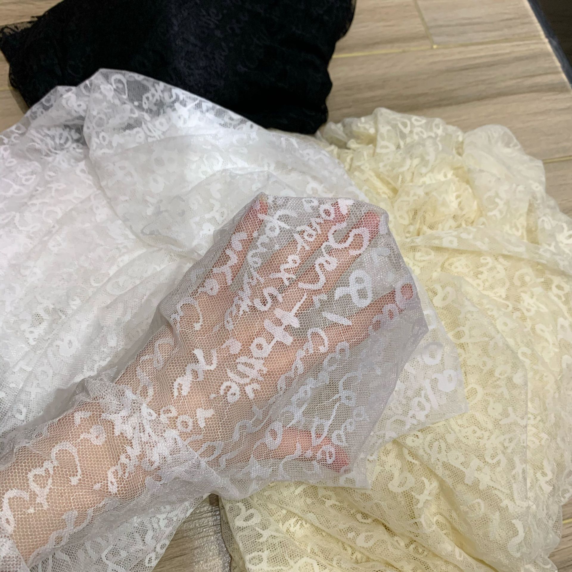 Fabricantes suministro directo nylon Spandex jacquard malla estiramiento letra Jacquard tela de hilo en stock