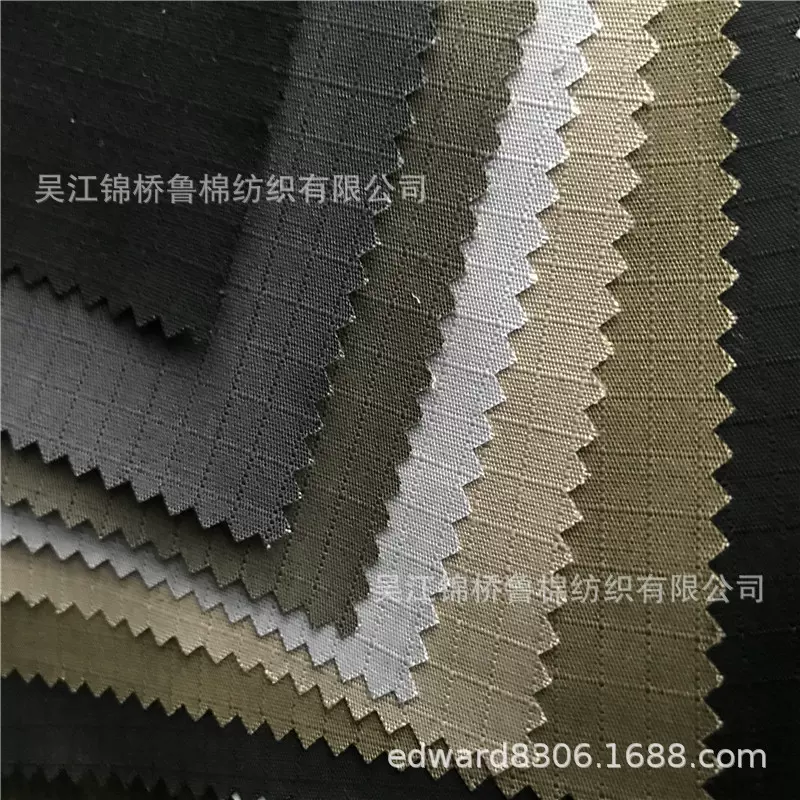 涤棉小方格子布21*21x16混纺CVC40/2*20交织提花色织弹力布格子布