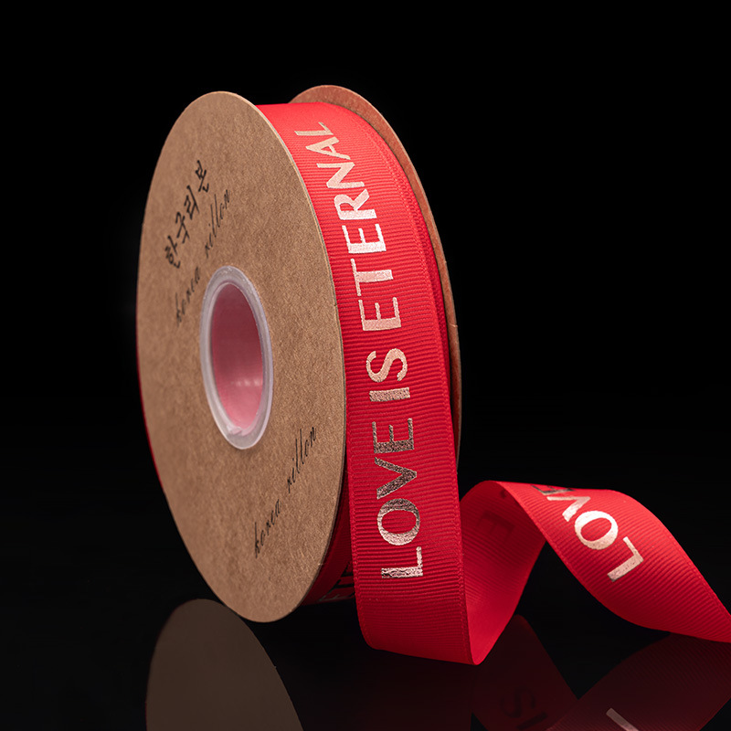 2,5 cm dorado cinta tienda de flores material de DIY floral al por mayor de la flor de poliéster Inglés carta envuelta cinta de la flor