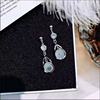 Fashionable earrings, silver needle, cat's eye, silver 925 sample