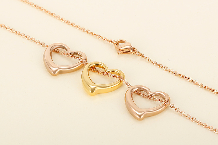 European and American new stainless steel heart-shaped peach heart necklace earrings jewelry set