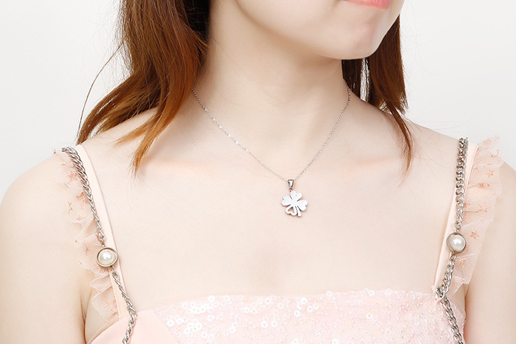 new stainless steel hollow four-leaf clover clavicle necklace earrings two-piece set wholesale