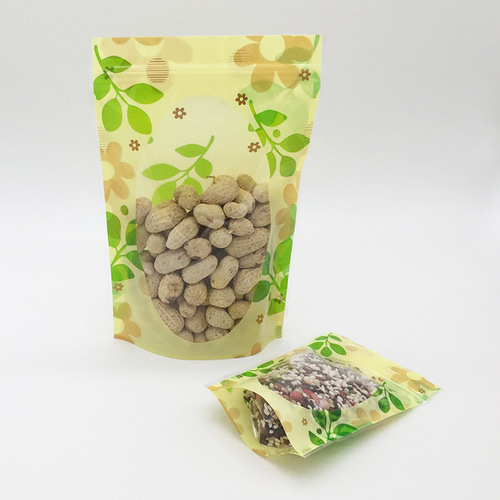 Factory direct sales green leaf three-color flower self-sealing self-standing bag flower tea sealing bag dried fruit and grain food packaging bag